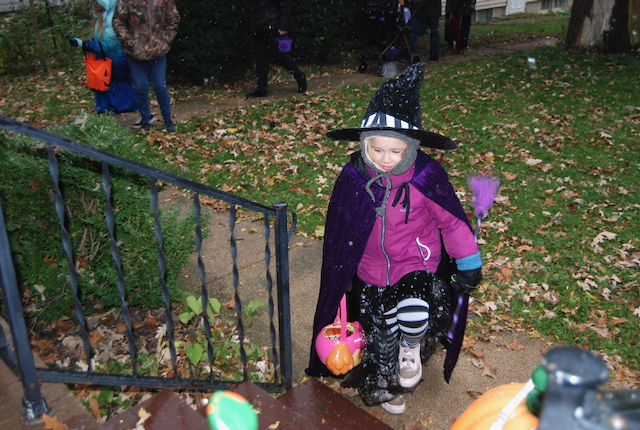 Costumed kids collect treats despite Mother Nature’s trick: snow 